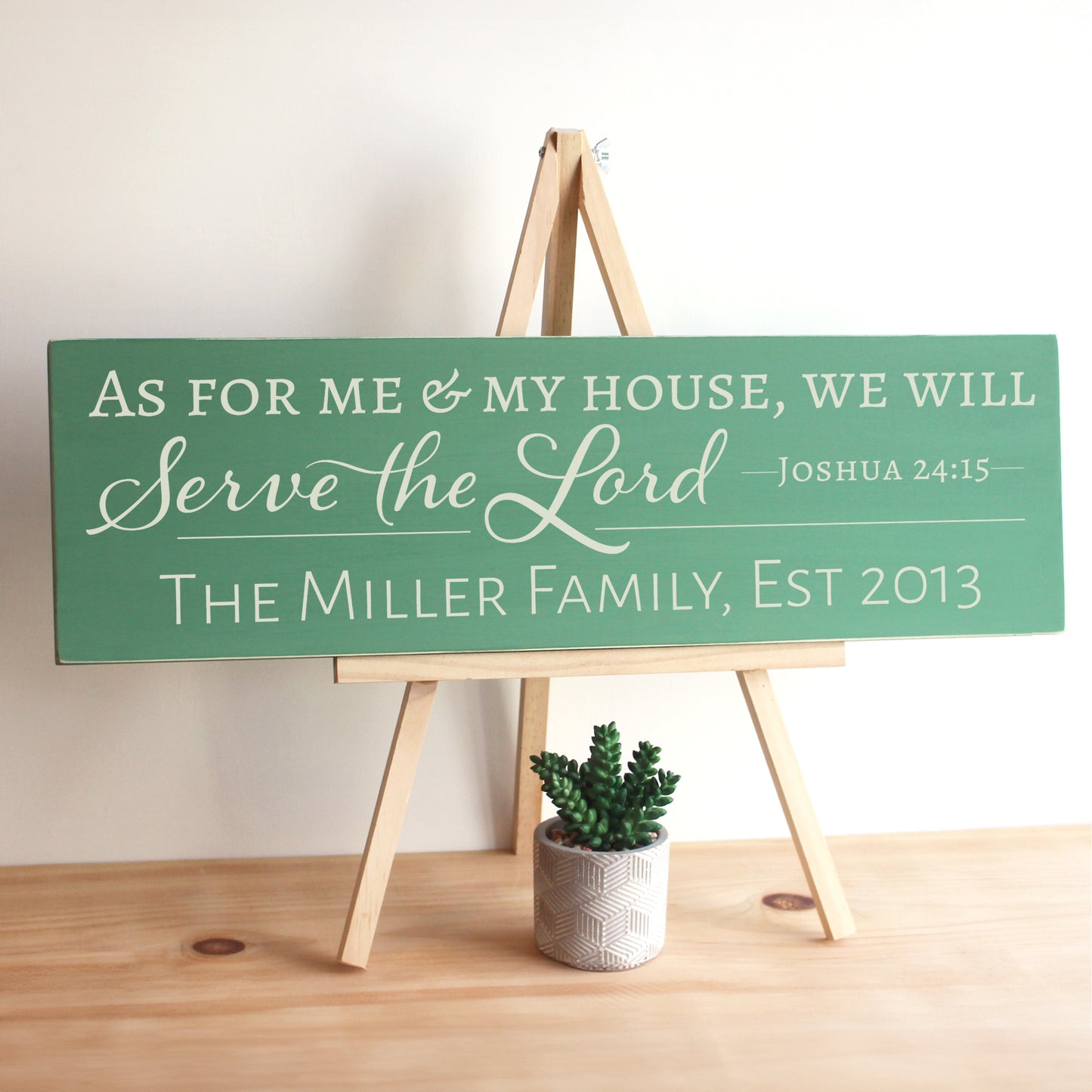 Handmade wooden sign reads, "As for me and my house, we will serve the Lord. Joshua 24:15" Personalized name and established date are included below.