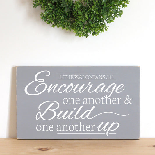 1 Thessalonians 5:11  Encourage one another and build one another up.  Farmhouse Wooden Bible Verse SIgn