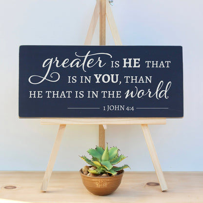 Greater is He that is in you, than he that is in the world.  1 John 4:4  Encouraging scripture sign in navy blue chalk paint.