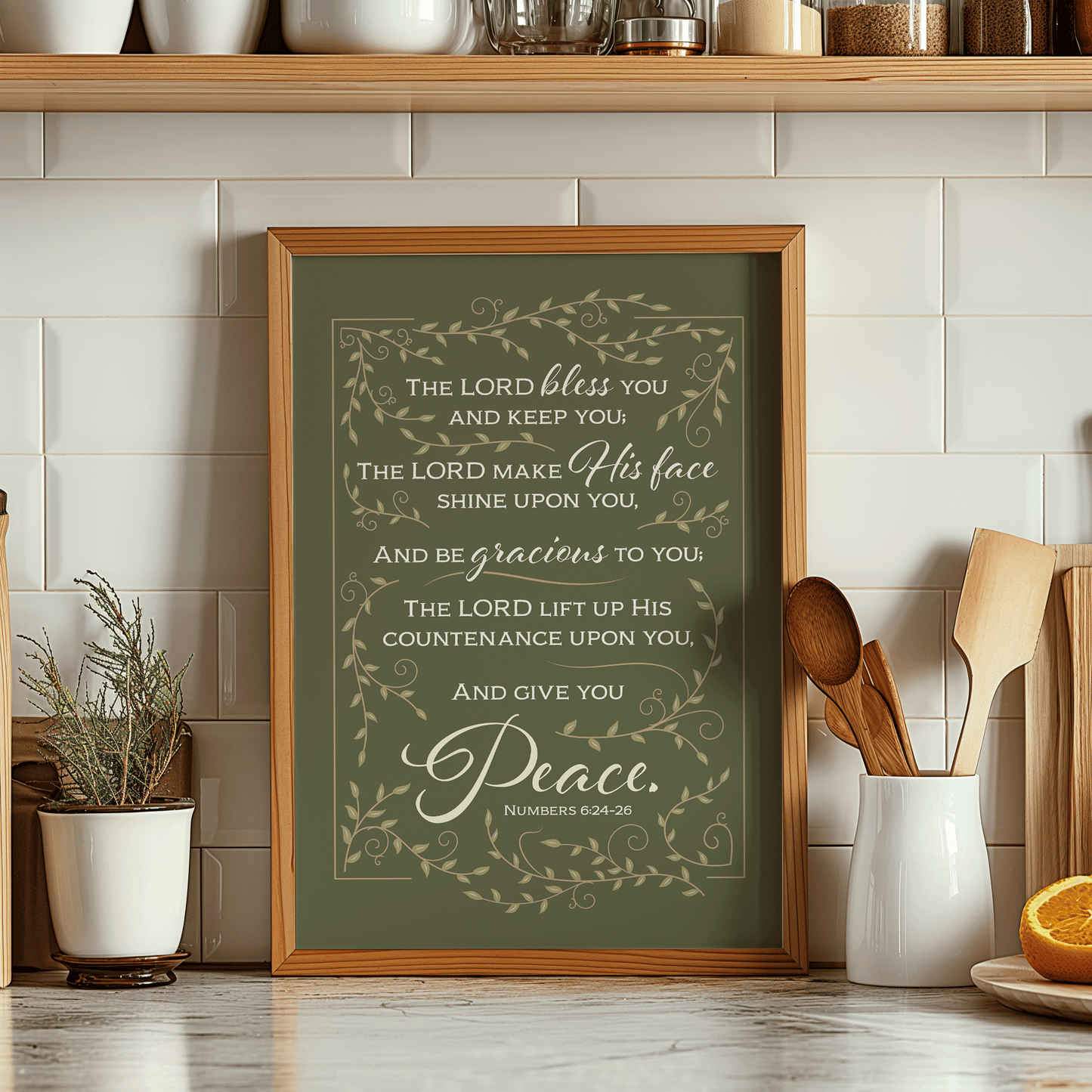 Aaronic Blessing print in sage green with leaf border. Numbers 6:24-26 benediction, "The Lord bless you and keep you."