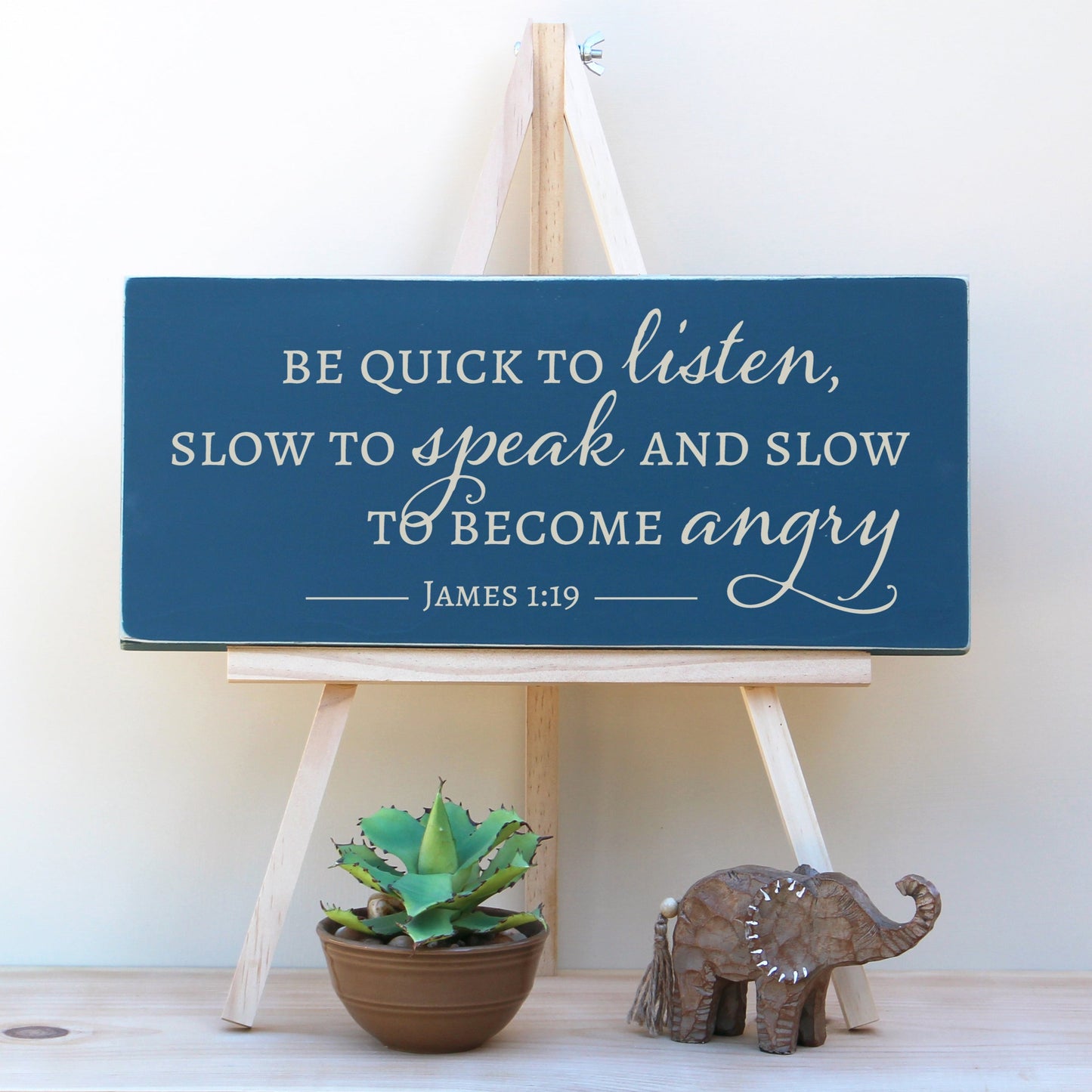 Be quick to listen, slow to speak and slow to become angry. James 1:19 Horizontal, wooden, Christian sign, perfect for your living room or homeschool room.
