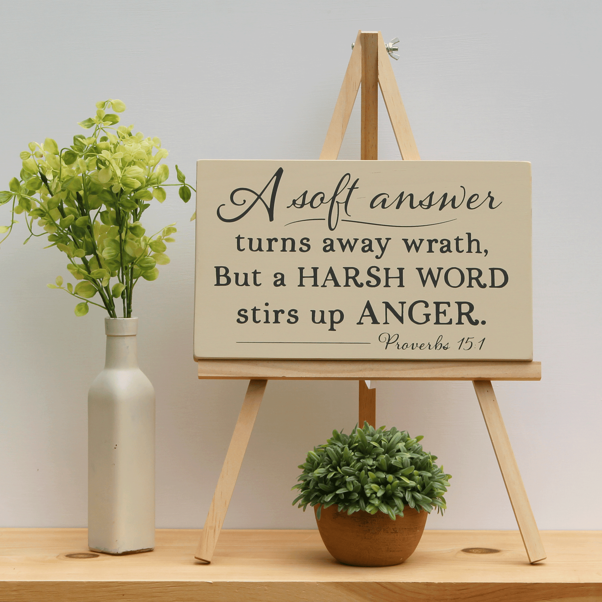A soft answer turns away wrath, but a harsh word stirs up anger.  Proverbs 15:1 rustic wooden scripture sign.