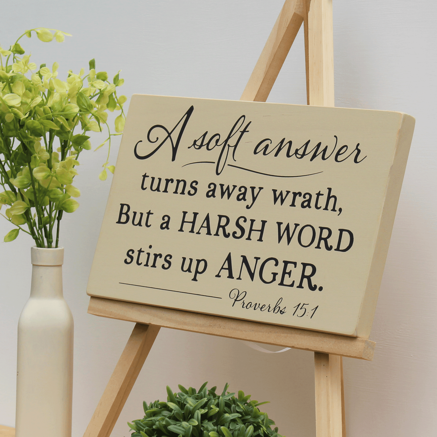 A soft answer turns away wrath, but a harsh word stirs up anger.  Proverbs 15:1 rustic wooden scripture sign.